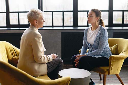 woman in addiction therapy